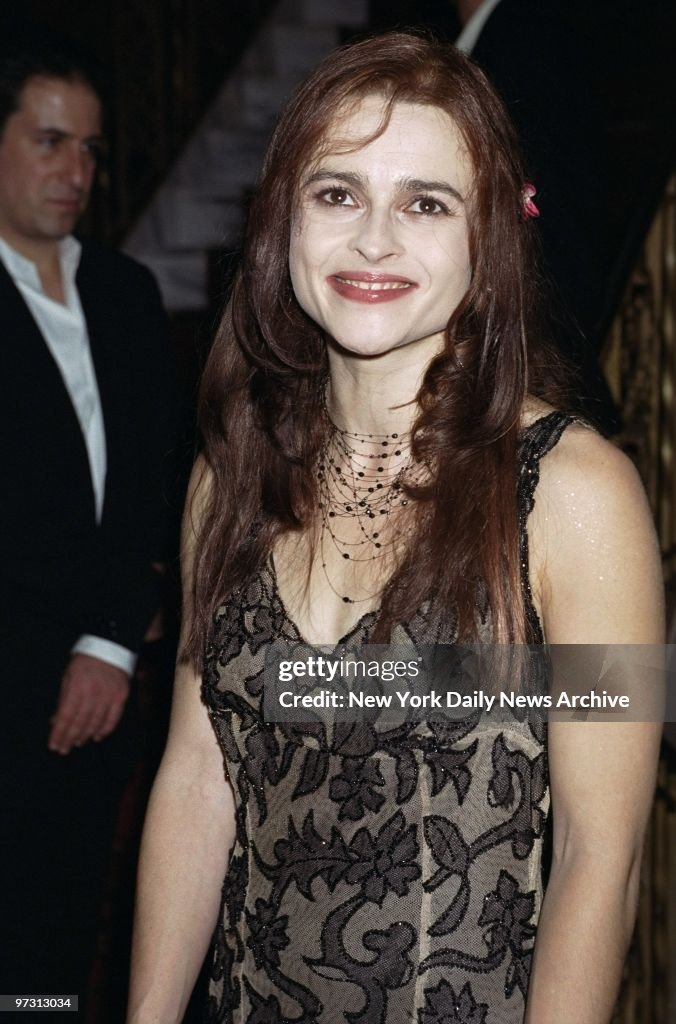 Helena Bonham Carter arrives smiling for a screening of the