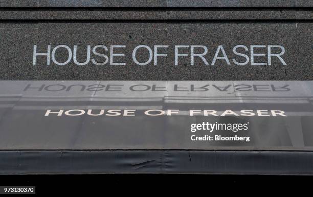 An awning hangs from a House of Fraser store, one of the stores slated for closure, on Oxford Street in central London, U.K., on Wednesday, June 13,...