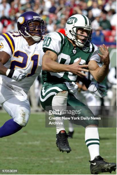 New York Jets' Wayne Chrebet is empty-handed as a pass goes incomplete in action against the Minnesota Vikings at Giants Stadium. The Vikings' Corey...