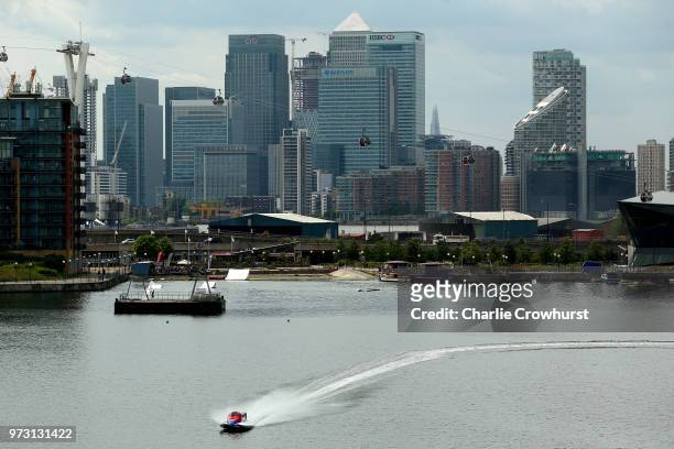 Twin seater makes its way down Victoria Dock with the London Docklands City in the background during the World Championship's press conference, ahead...