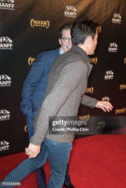 Sir Peter Ustinov Comedy Award recipient Sean Hayes and "Travellers" actor and Rockie Awards Gala presenter Eric McCormack arrive at the Rockie...