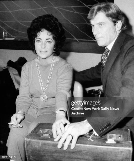 John Warner and new bride Elizabeth Taylor.