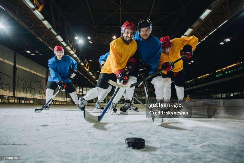 Below Ice Rink Below View Of Ice Hockey Rivals Having A Match In A Rink High-Res Stock ...