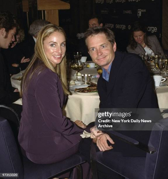 Tracy Pollan and husband Michael J. Fox share a table at a George magazine luncheon at the Four Seasons restaurant.