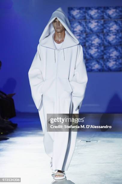 Model walks the runway at the Fumito Ganryu fashion show during the 94th Pitti Immagine Uomo on June 13, 2018 in Florence, Italy.