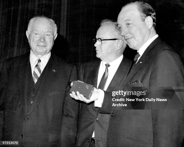 David Sarnoff, RCA board chairman: Elmer Engstrom, executive comittee chairman, and Robert Sarnoff, president at the company's annual stockholder...