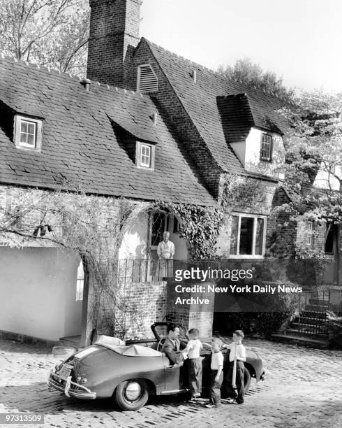 Johnny Carson and his family at his home, Birch Hill Estate, Winfield Ave, Harrison, N.Y. Arriving home after his afternoon TV show, Johnny drives...