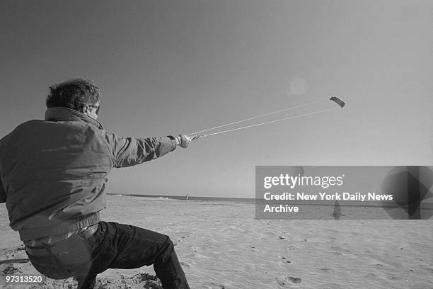 Glen Powell of St. James, L.I., flying his kite at Jones Beach.