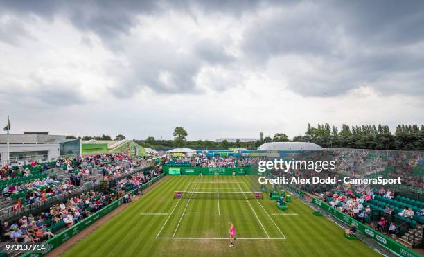 Mona Barthel returns serve to Magdalena Rybarikova during day 3 of the Nature Valley Open Tennis Tournament at Nottingham Tennis Centre on June 13,...