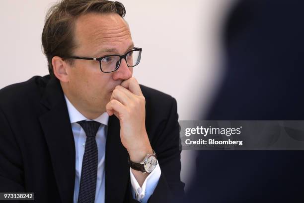 Markus Krebber, chief financial officer of RWE AG, pauses during an interview in Berlin, Germany, on Wednesday, June 13, 2018. The asset...