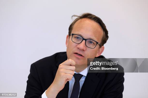 Markus Krebber, chief financial officer of RWE AG, speaks during an interview in Berlin, Germany, on Wednesday, June 13, 2018. The asset...