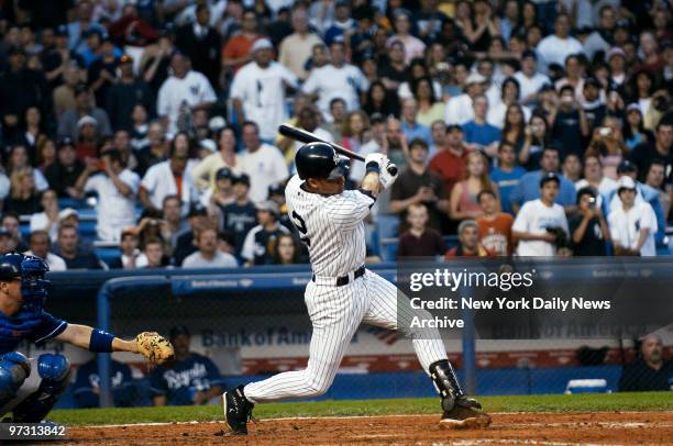 New York Yankees' shortstop Derek Jeter smacks an infield single for his 2,000th career hit in the fourth inning of a game against the Kansas City...