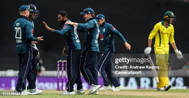 England's Adil Rashid celebrates trapping Australia's Ashton Agar lbw during the Royal London 1st ODI match between England and Australia at The Kia...