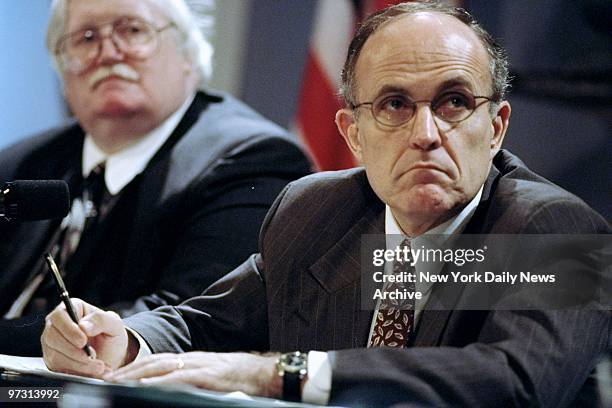 Mayor Rudy Giuliani at a hearing in the City Hall Blue Room where he signed the sprinkler bill, which affects city fire codes.