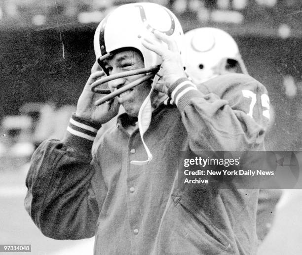 Johnny Unitas, Baltimore Colts quarterback, on the sidelines during game against the New York Giants at Yankee Stadium. Unitas did not play.