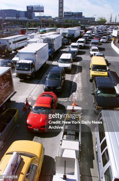Traffic is backed up on the New Jersey side of the Lincoln Tunnel, where there were delays of two to three hours as New York worked to get back to...