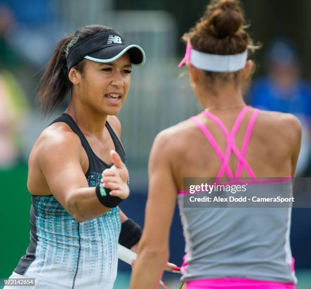 Heather Watson shares a word with her partner Mihaela Buzarnescu during day 3 of the Nature Valley Open Tennis Tournament at Nottingham Tennis Centre...