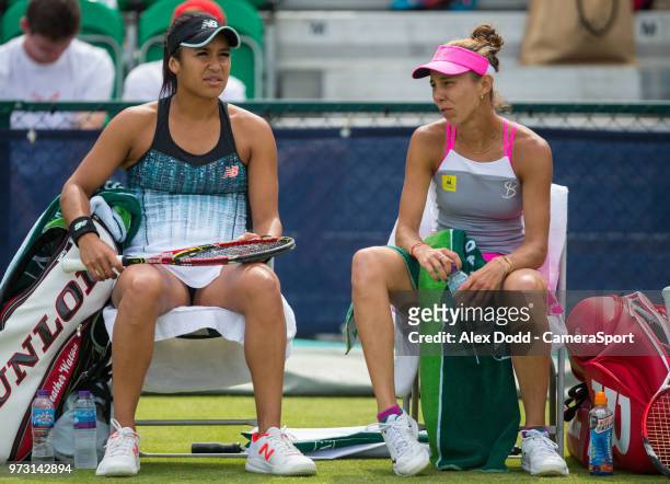 Heather Watson shares a word with her partner Mihaela Buzarnescu during day 3 of the Nature Valley Open Tennis Tournament at Nottingham Tennis Centre...