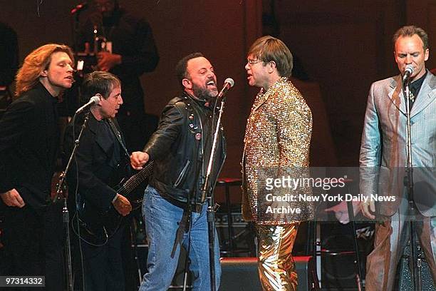 Jon Bon Jovi, Paul Simon, Billy Joel, Elton John and Sting performing during a Rainforest Foundation International benefit concert at Carnegie Hall.