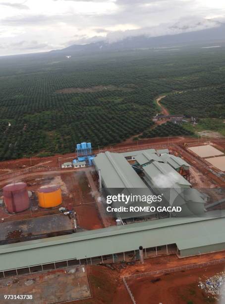 In this photograph taken during a media trip organized by the palm oil unit of Sinar Mas, PT SMART , on August 2, 2010 a newly built palm oil mill...