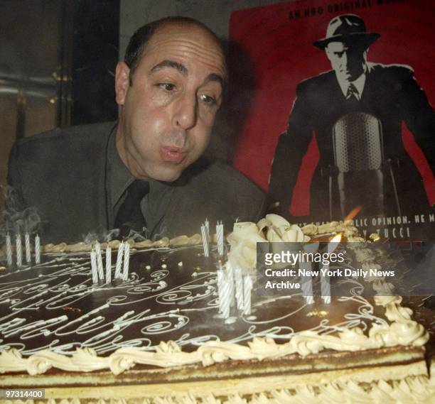 Stanley Tucci blowing out birthday cake at premiere of "Winchell" at the Museum of Television and Radio.
