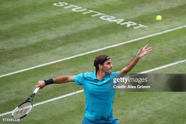 Roger Federer of Switzerland serves the ball to Mischa Zverev of Germany during day 3 of the Mercedes Cup at Tennisclub Weissenhof on June 13, 2018...