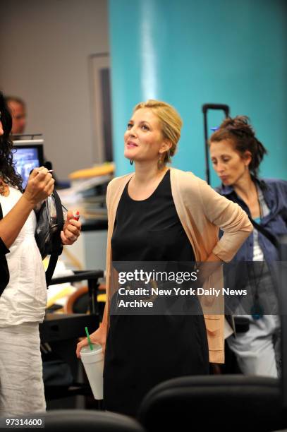 Going The Distance starring Drew Barrymore , who plays a reporter, films in the City Room of the New York Daily News.