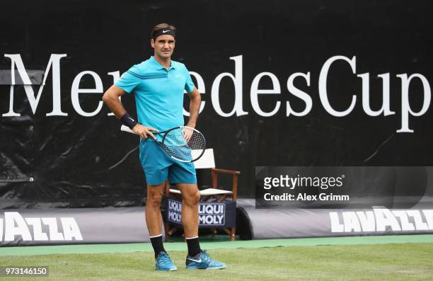Roger Federer of Switzerland reacts during his match against Mischa Zverev of Germany during day 3 of the Mercedes Cup at Tennisclub Weissenhof on...
