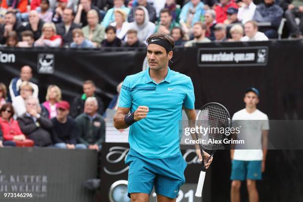 Roger Federer of Switzerland celebrates during his match against during day 3 of the Mercedes Cup at Tennisclub Weissenhof on June 13, 2018 in...