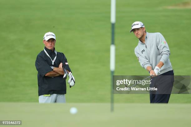 Richy Werenski of the United States chips to a green during a practice round prior to the 2018 U.S. Open at Shinnecock Hills Golf Club on June 13,...