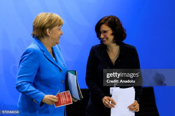 German Chancellor Angela Merkel , and Spokeswoman of the New German Organizations, Ferda Ataman give a joint press conference following a meeting...