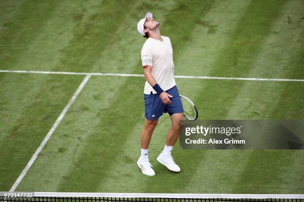 Mischa Zverev of Germany reacts during his match against Roger Federer of Switzerland during day 3 of the Mercedes Cup at Tennisclub Weissenhof on...