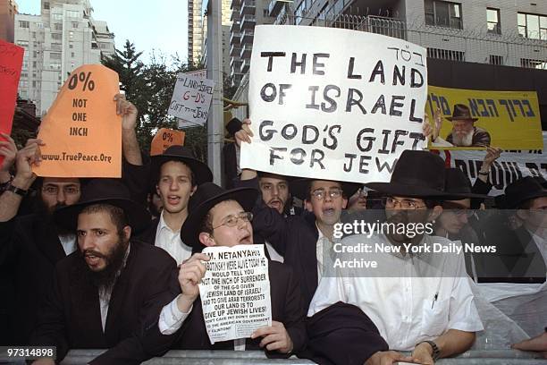 Demonstrators during Israeli Prime Minister Benjamin Netanyahu's visit to Hunter College Assembly Hall for speech hosted by JCRC .