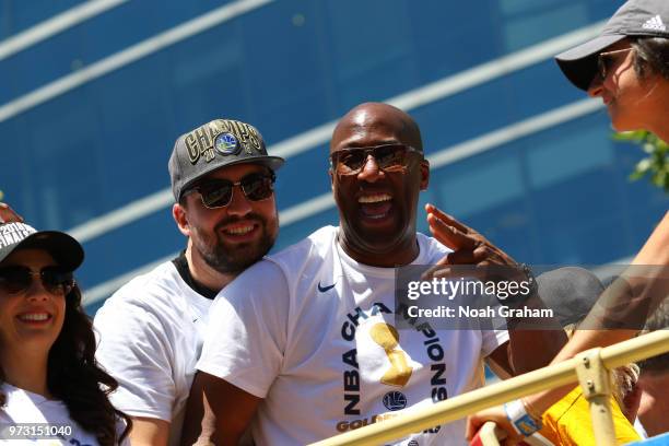 Chris DeMarco and Mike Brown of the Golden State Warriors pose for a photo during the Golden State Warriors Victory Parade on June 12, 2018 in...