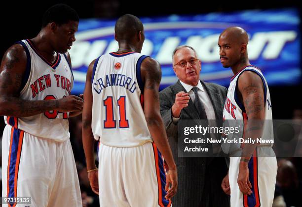 New York Knicks' coach Larry Brown talks to guard Stephon Marbury during a time out in the first half of a game against the Atlanta Hawks. The Knicks...