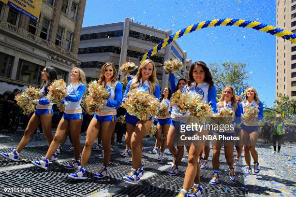 The Golden State Warriors dance team poses for a photo during the Golden State Warriors Victory Parade on June 12, 2018 in Oakland, California. NOTE...