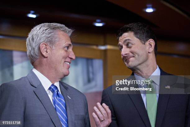 House Speaker Paul Ryan, a Republican from Wisconsin, right, talks to House Majority Leader Kevin McCarthy, a Republican from California, during a...