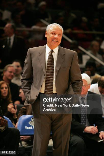 New York Knicks' coach Lenny Wilkens smiles as an announcer notes that today is his birthday during a preseason game against the Utah Jazz at Madison...
