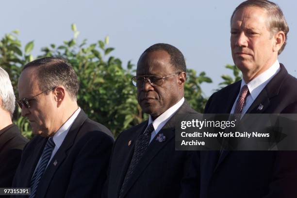 Mayor Rudy Giuliani, Santo Domingo's Mayor Johnny Ventura and Gov. George Pataki attend a prayer service for victims of the crash of American...