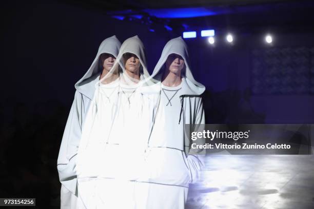 Model walks the runway at the Fumito Ganryu fashion show during the 94th Pitti Immagine Uomo on June 13, 2018 in Florence, Italy.