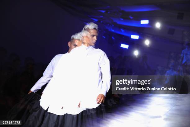 Model walks the runway at the Fumito Ganryu fashion show during the 94th Pitti Immagine Uomo on June 13, 2018 in Florence, Italy.