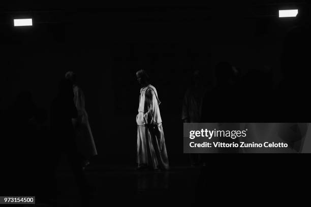 Model walks the runway at the Fumito Ganryu fashion show during the 94th Pitti Immagine Uomo on June 13, 2018 in Florence, Italy.