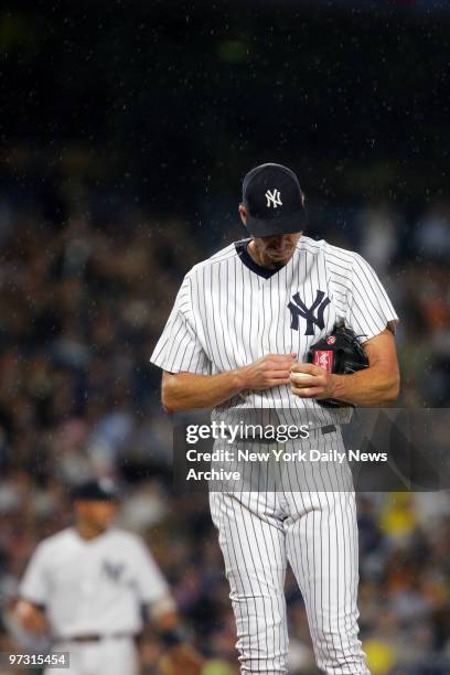 New York Yankees' starter Randy Johnson is on the mound against the Los Angeles Angels early in Game 3 of the American League Division Series at...