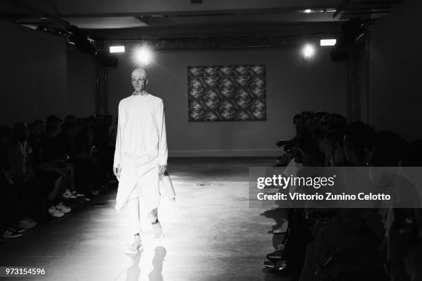 Model walks the runway at the Fumito Ganryu fashion show during the 94th Pitti Immagine Uomo on June 13, 2018 in Florence, Italy.