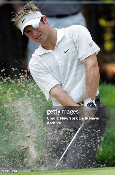 Trevor Immelman hits out of a bunker during first round play in the 87th PGA Championship at Baltusrol Golf Club in Springfield, N.J.