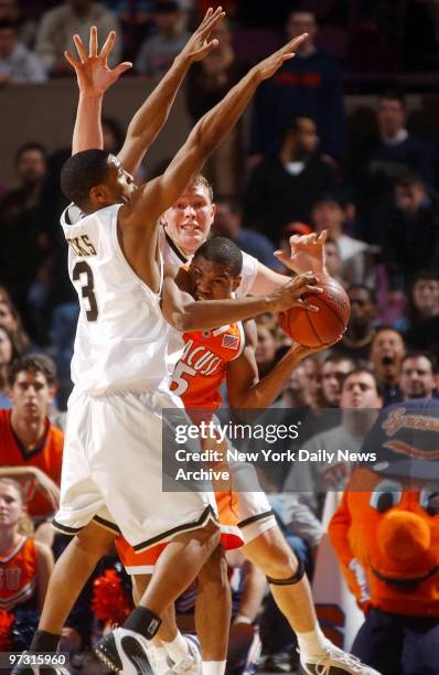 Syracuse's James Thues fights through double team during second half action against Wake Forest at 17th annual pre-season NIT championship game at...