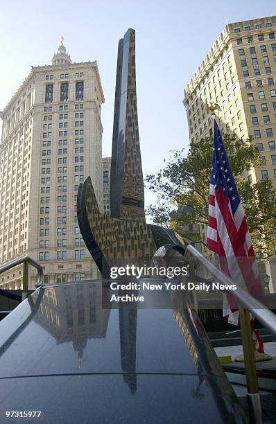 Triumph of the Spirit, a 50-foot tall, black granite sculpture, stands tall during its dedication at Foley Square Park. The monument is a memorial to...