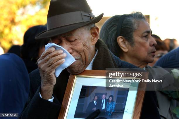 Jose Alcantara weeps for his lost daughter, Rosa, during a memorial service this morning on the fourth anniversary of the crash of American Airlines...