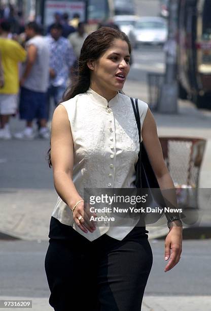 Debbie Rosado, the mother of Marc Anthony's child, leaves Queens Family Court, where she is suing the heartthrob singer for more support.