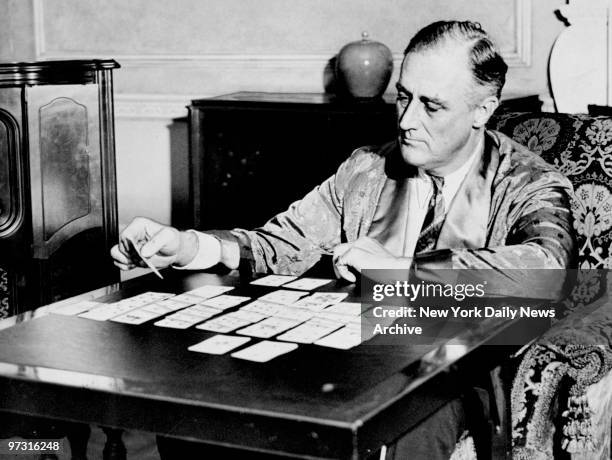 Gov. Franklin D. Roosevelt taking a small break from work at the Executive Mansion.
